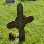 This iron cross is one of the more unusual monuments at Old Holy Cross Cemetery.