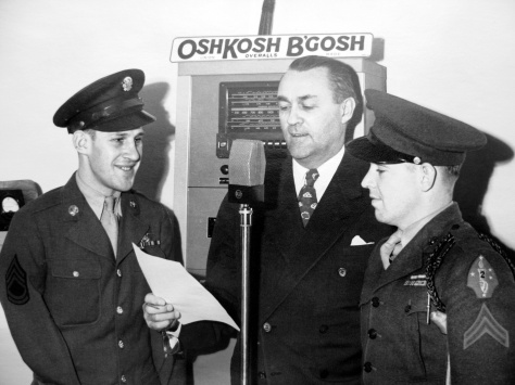 Sgt. Louis C. Koth (left) and Marine Cpl. Earl J. Mulqueen Jr. are introduced at the Oshkosh B'Gosh Inc. bond rally on November 30, 1944.
