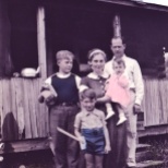 This Hanneman family vacation portrait was somewhat clumsily done, with colors spilling onto skin and other areas. At front and center is David D. Hanneman. In the back are Donn G. Hanneman, Ruby V. Hanneman, Carl F. Hanneman and baby Lavonne M. Hanneman. Photo circa 1940.