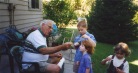 Grandpa Dave with Stevie and Samantha Hanneman.